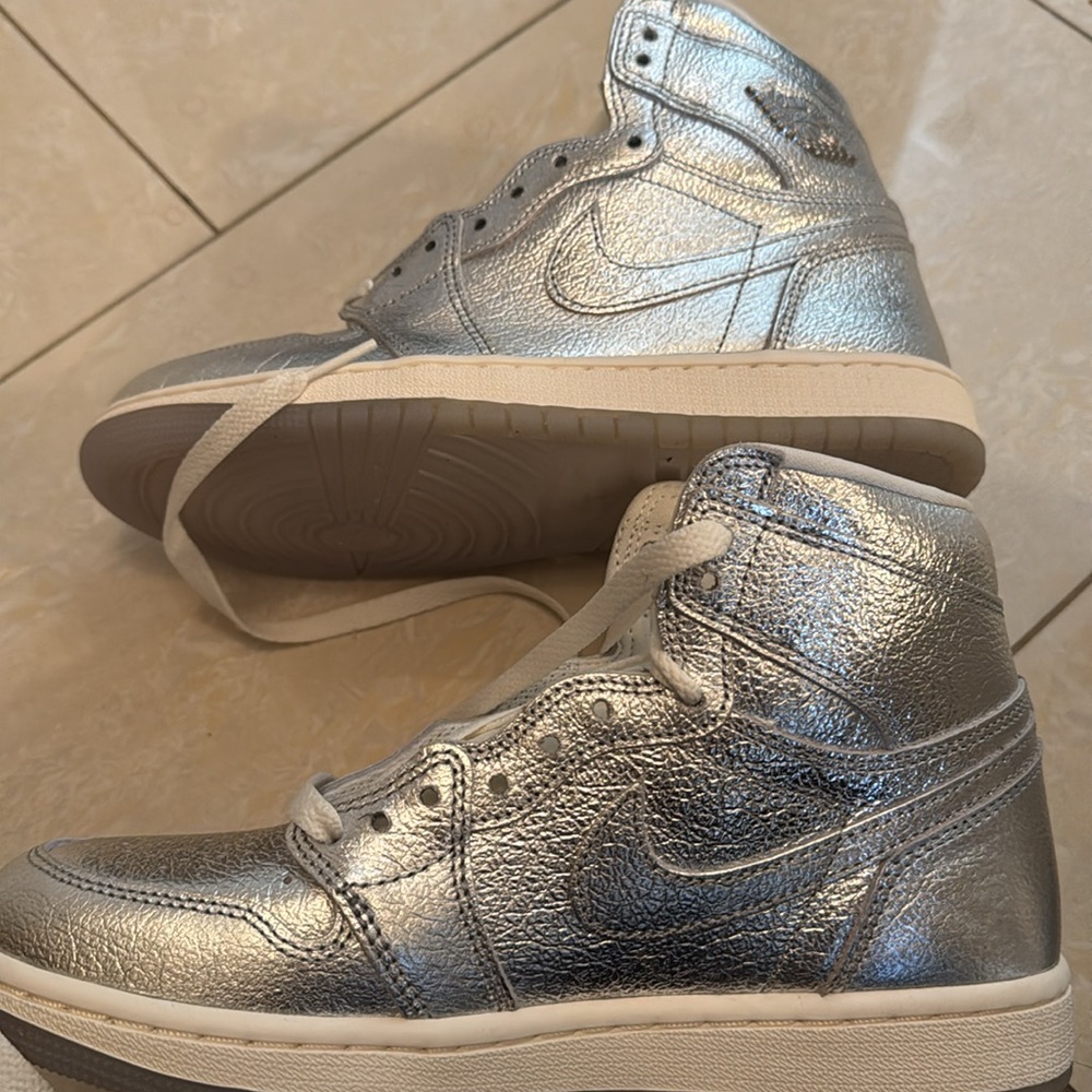 Air Jordan 1985 silver high top sneakers